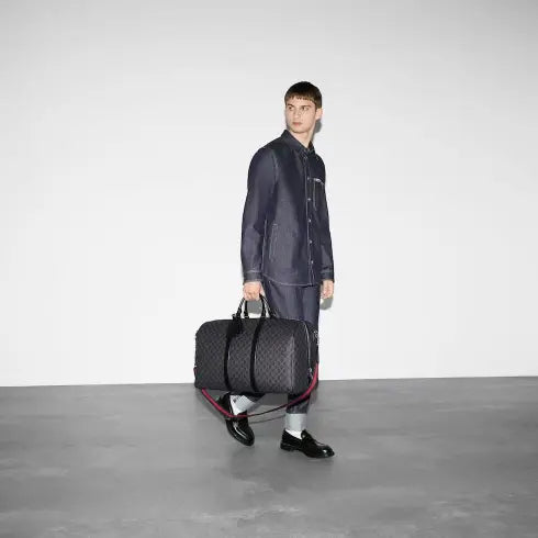 GG supreme travel bag