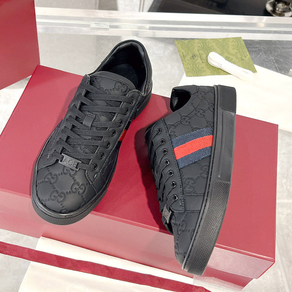 Men's Ace Series GG Embossed Leather Low-Top Sneakers - Black |625787 1XK10 1000